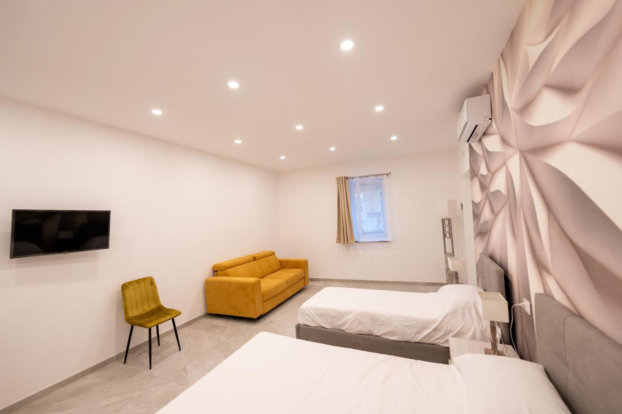 Suites Gaudioso Napoli Center ภายนอก รูปภาพ